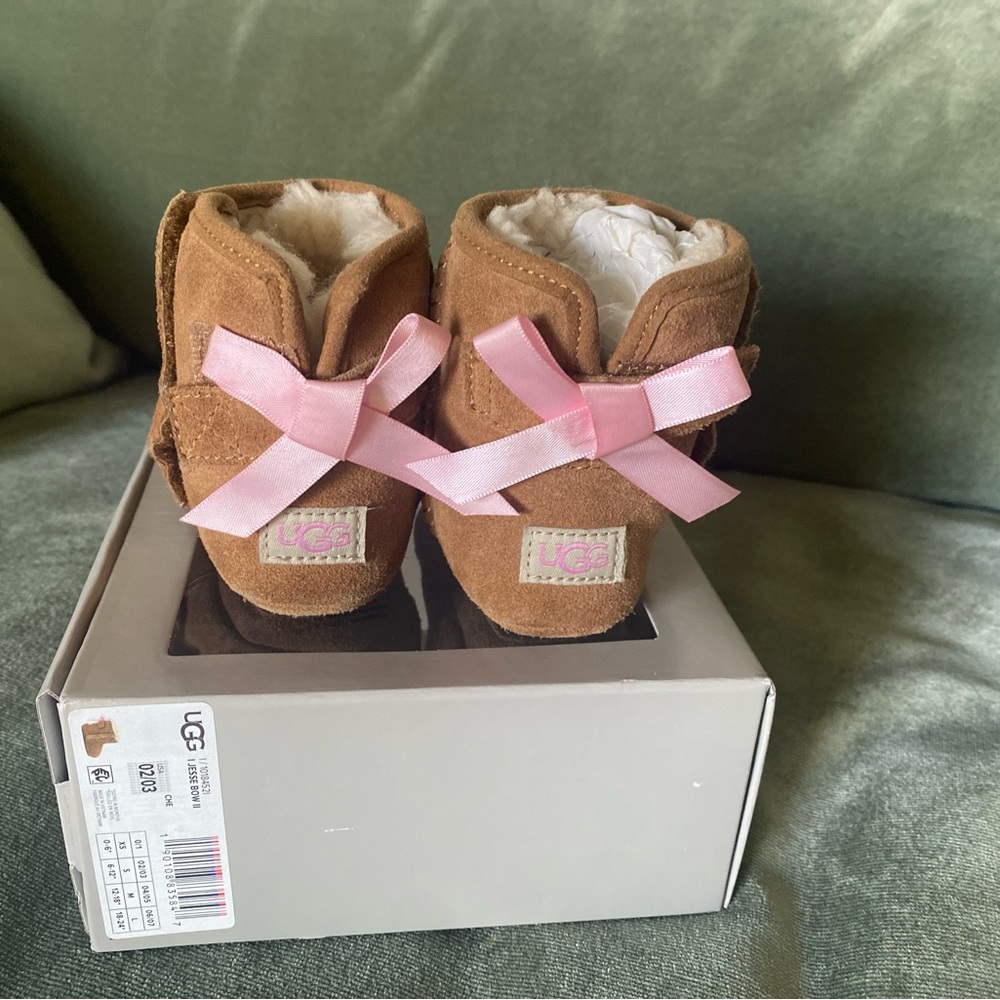 UGG mini boots toddler size 2/3 with bow! So cute and comfortable.
